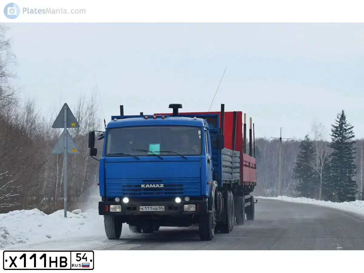 Фото автомобиля KAMAZ 53215 /6X4/, 2012 — госномер Х111НВ54. Цвет: синий