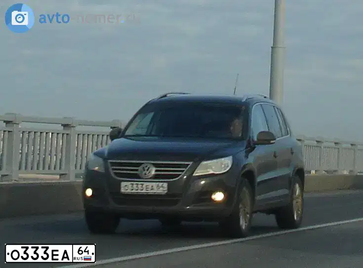 Фото автомобиля VOLKSWAGEN TIGUAN, 2010 — госномер Н014АН164. Цвет: ЧЕРНЫЙ