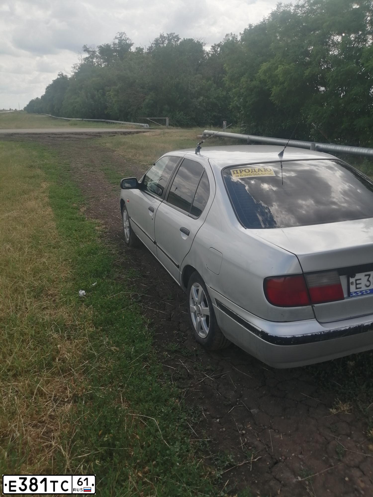 Фото автомобиля NISSAN PRIMERA, 1998 — госномер Е381ТС61. Цвет: Серебристый