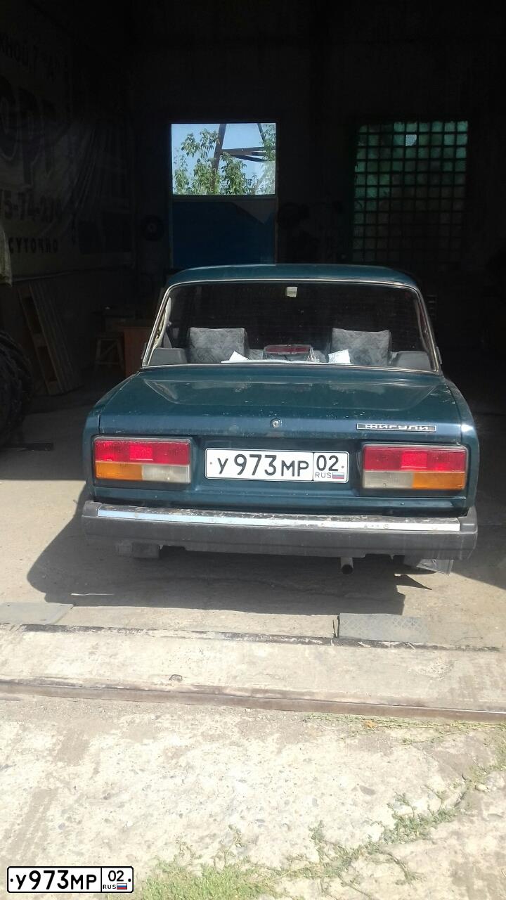 Фото автомобиля LADA 2107 LADA, 2005 — госномер У973МР02. Цвет: Темно-зеленый