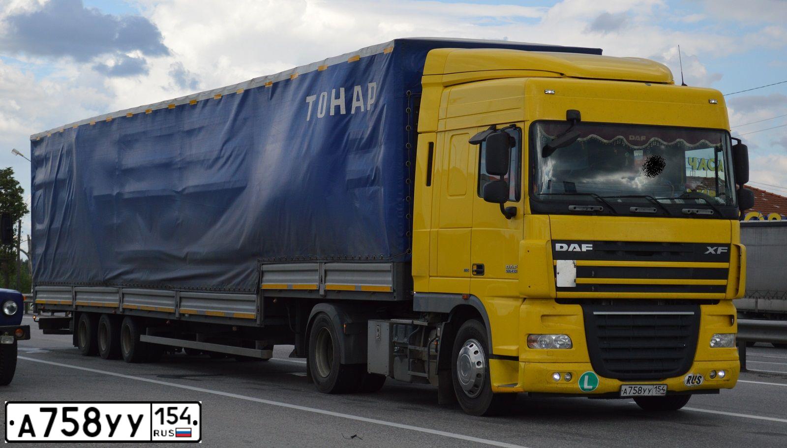 Фото автомобиля DAF XF 105 FT /4X2/, 2009 — госномер А758УУ154. Цвет: ЖЕЛТЫЙ