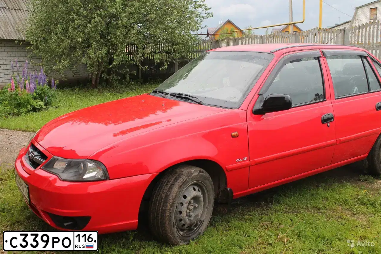 Фото автомобиля DAEWOO NEXIA, 2012 — госномер У155РТ193. Цвет: ЯРКО-КРАСНЫЙ