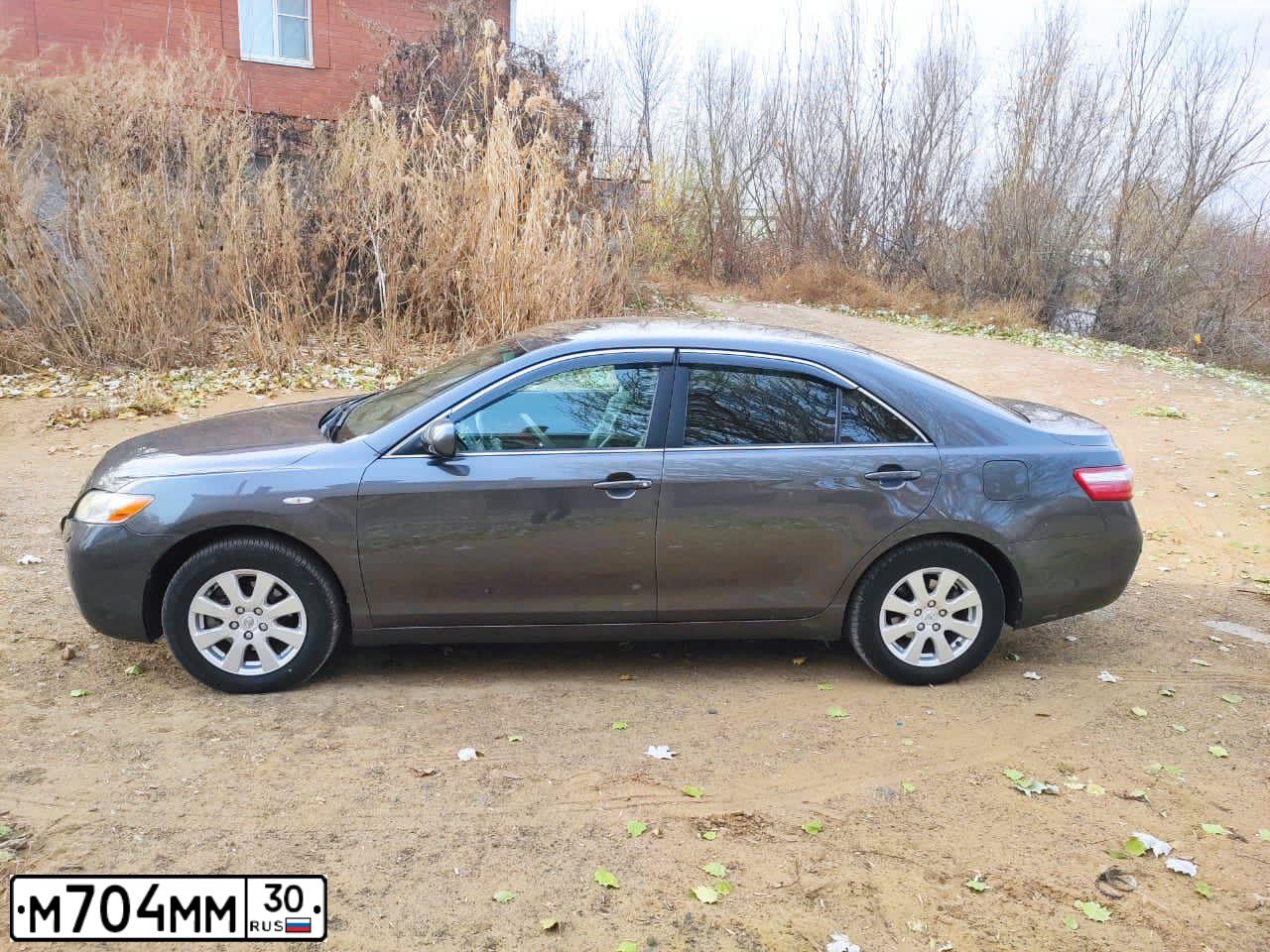 Фото автомобиля KIA SPORTAGE, 2010 — госномер В993ОВ30. Цвет: Коричневый