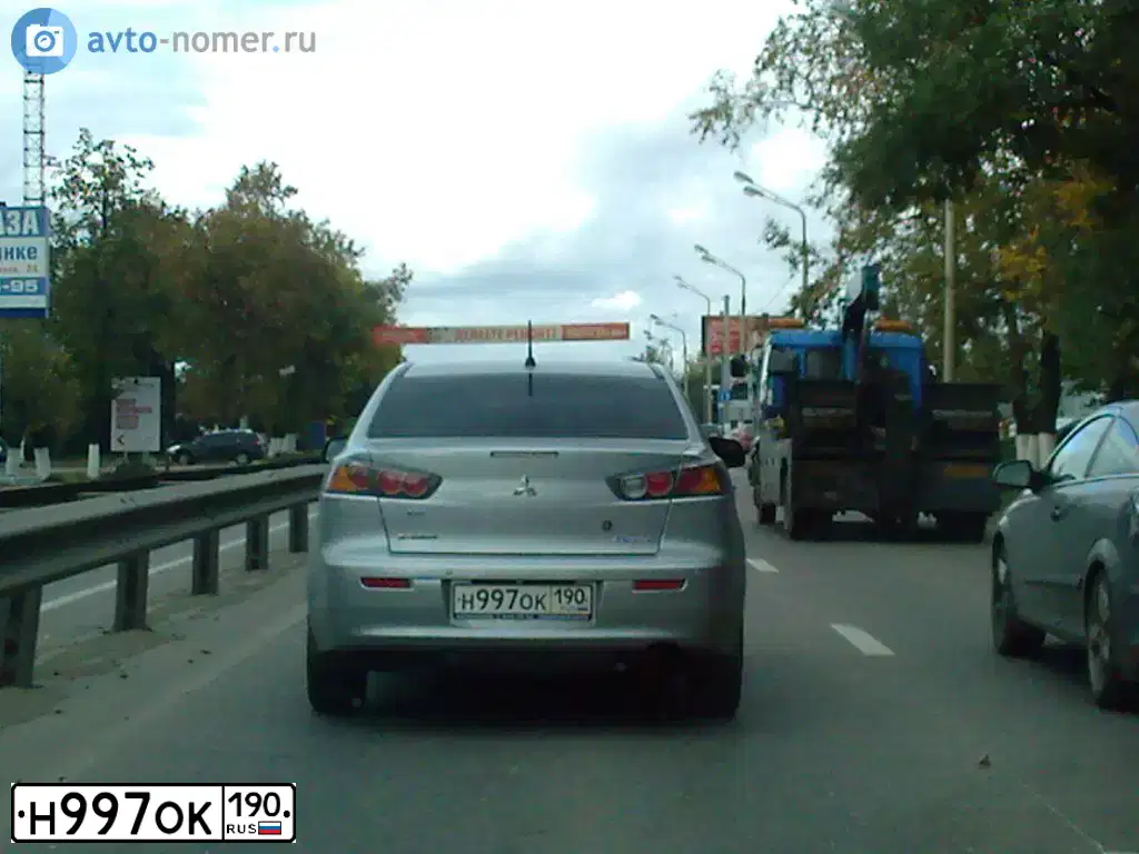 Фото автомобиля МИЦУБИСИ ЛАНСЕР 1,5, 2010 — госномер Н997ОК190. Цвет: СЕРЫЙ