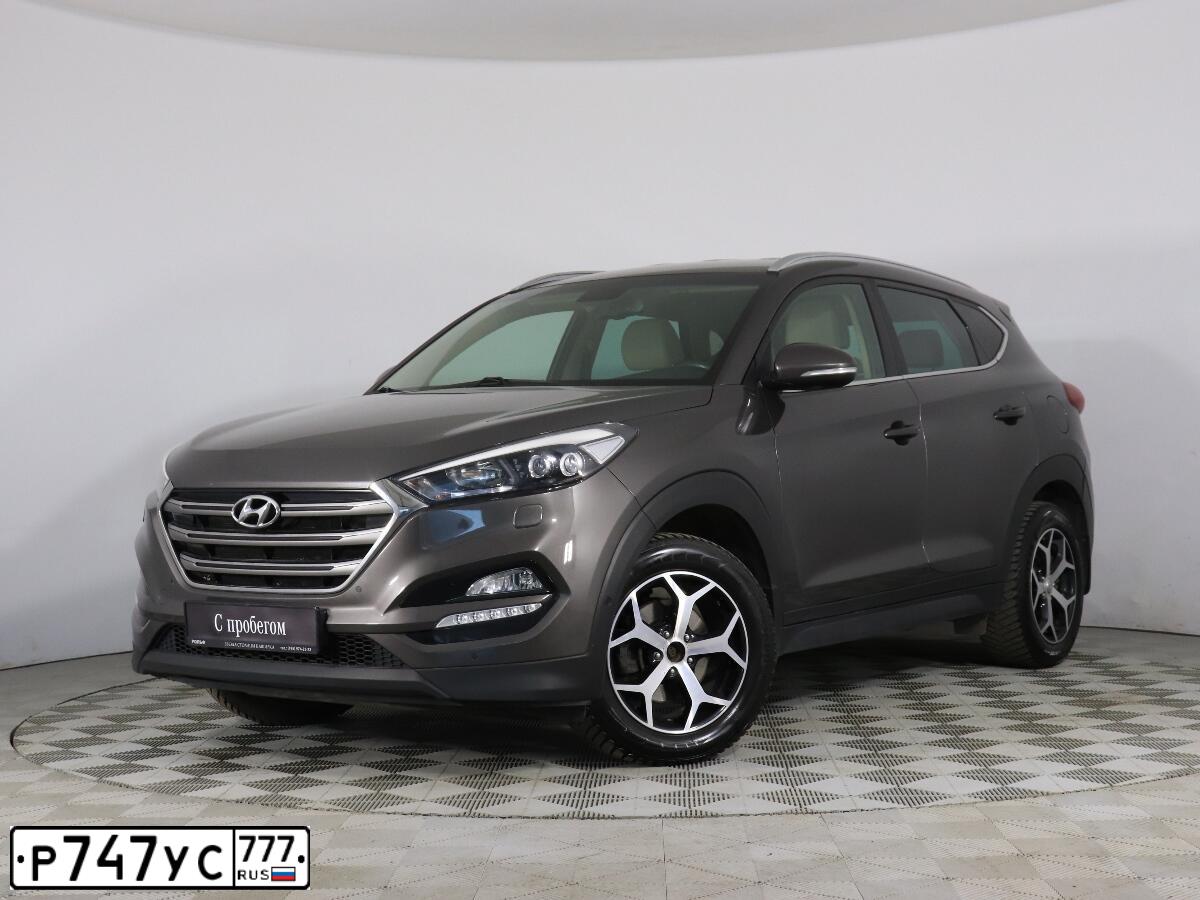 Фото автомобиля HYUNDAI TUCSON, 2016 — госномер Е476ЕЕ777. Цвет: КОРИЧНЕВЫЙ