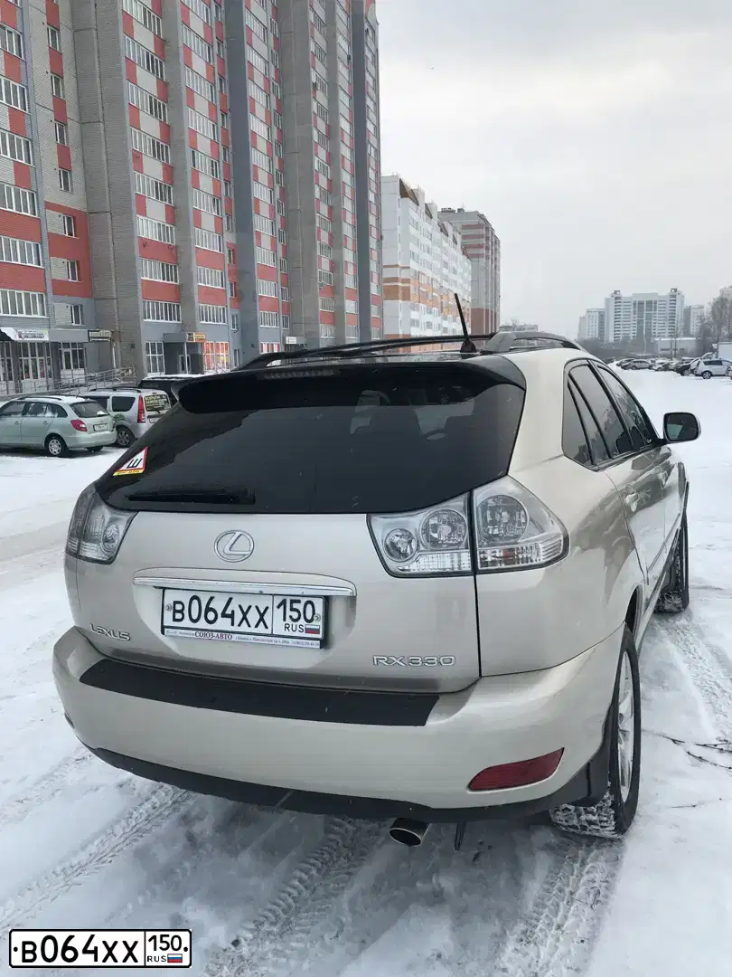 Фото автомобиля LEXUS RX, 2005 — госномер Т043ЕУ138. Цвет: ЗОЛОТИСТЫЙ