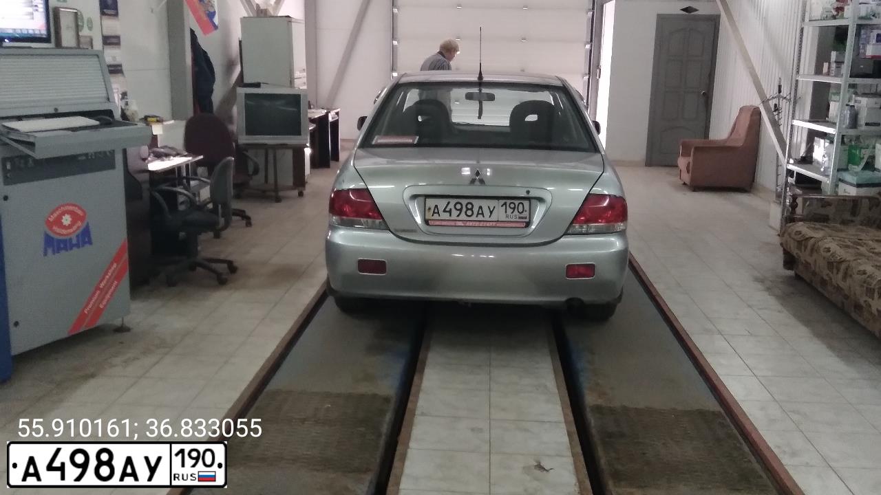 Фото автомобиля MITSUBISHI LANCER, 2006 — госномер Е119ВХ977. Цвет: СЕРЕБРИСТЫЙ