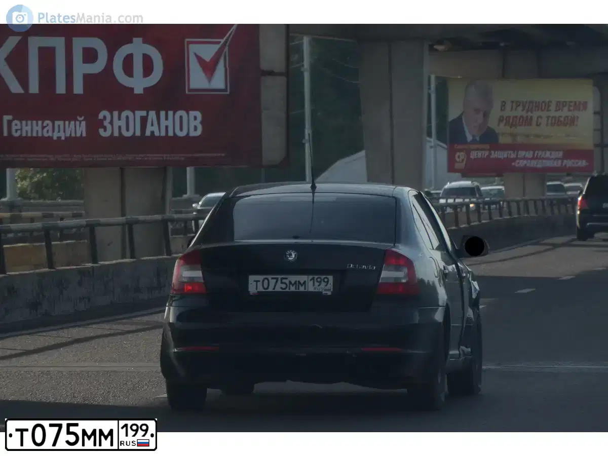 Фото автомобиля SKODA OCTAVIA, 2010 — госномер Т075ММ199. Цвет: ЧЕРНЫЙ
