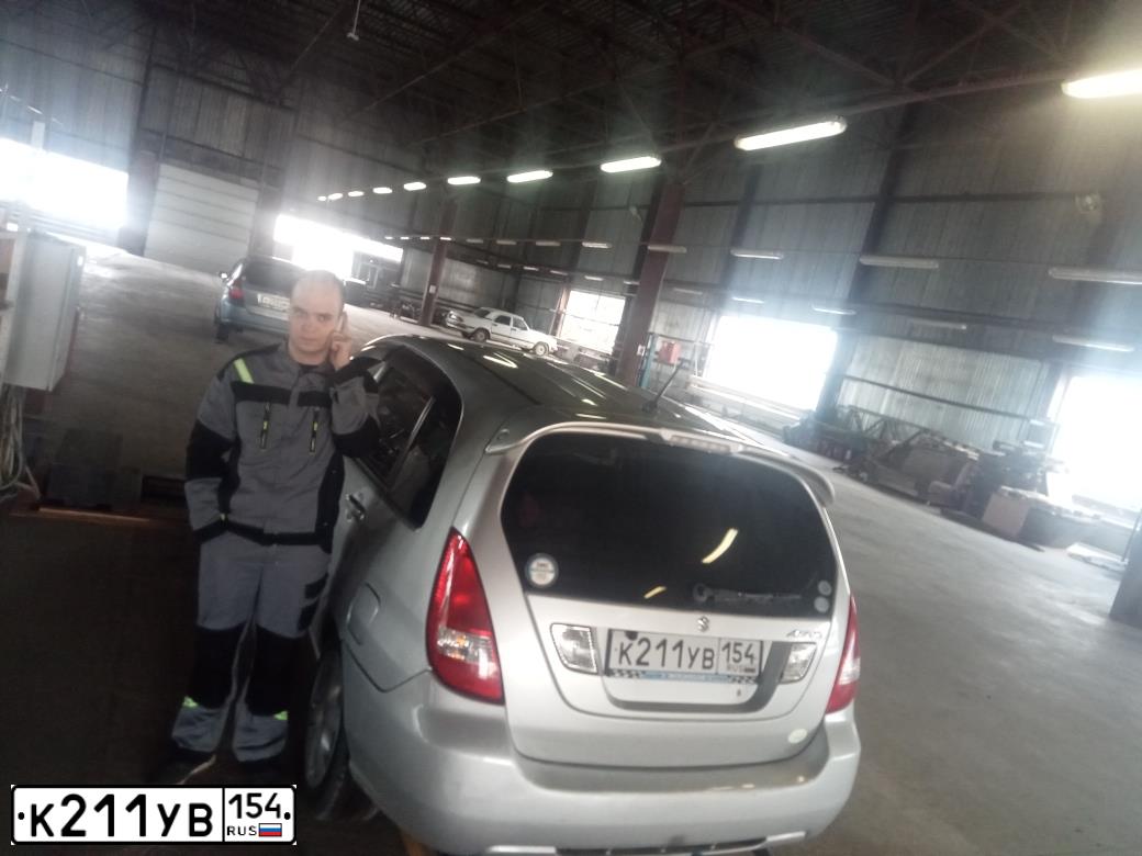 Фото автомобиля GAZ 3110 WOLGA, 2000 — госномер К211УВ54. Цвет: БАКЛАЖАНОВЫЙ