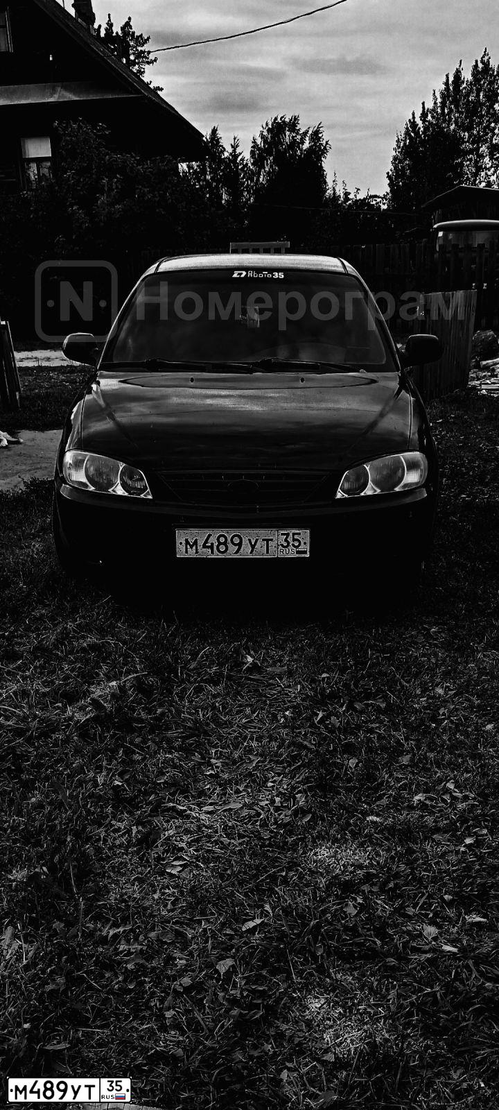 Фото автомобиля KIA SPECTRA, 2006 — госномер М489УТ35. Цвет: синий