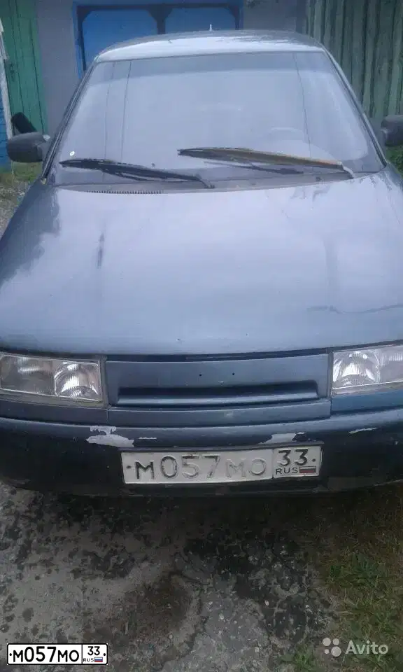 Фото автомобиля LADA 2112 LADA, 2007 — госномер В155СХ164. Цвет: СЕРО-СИНЕ-ЗЕЛЕНЫЙ