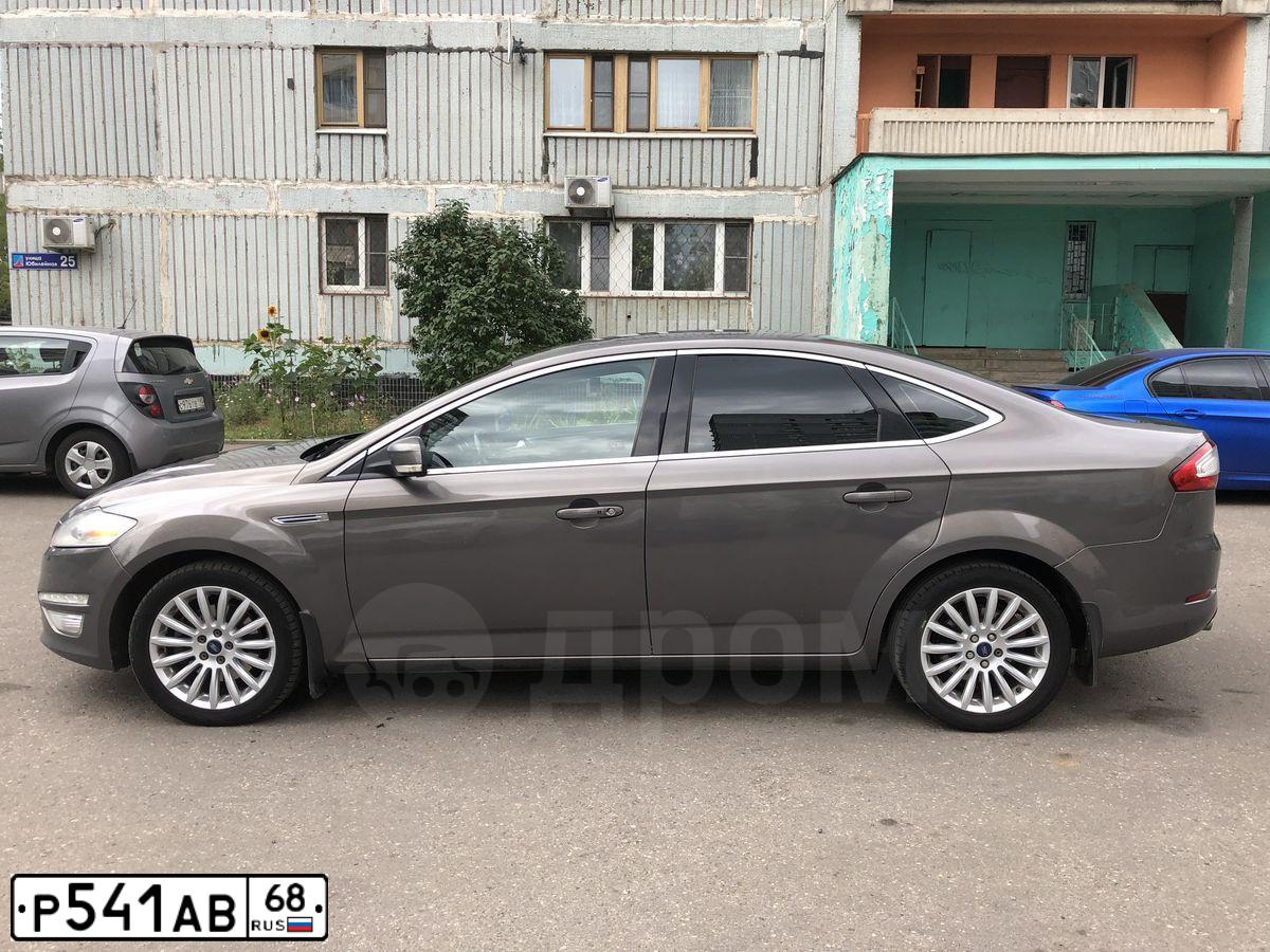 Фото автомобиля FORD MONDEO, 2012 — госномер С955КН977. Цвет: СЕРО-КОРИЧНЕВЫЙ