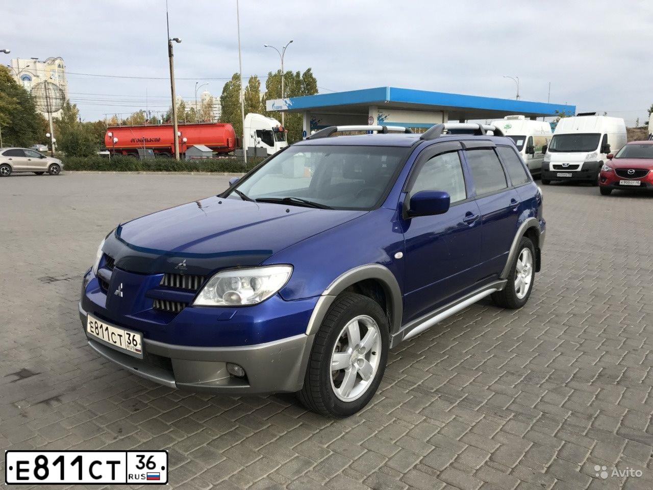 Фото автомобиля MITSUBISHI OUTLANDER, 2005 — госномер Р124ЕН32. Цвет: СИНИЙ