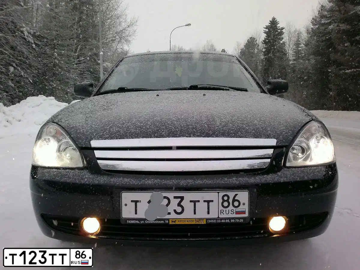 Фото автомобиля MITSUBISHI OUTLANDER, 2012 — госномер У098УХ72. Цвет: ЧЕРНЫЙ