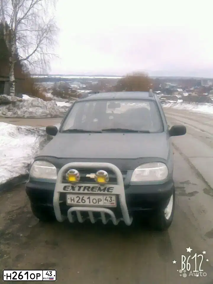 Фото автомобиля CHEVROLET NIVA, 2007 — госномер Н261ОР43. Цвет: Темно серо-зеленый металлик