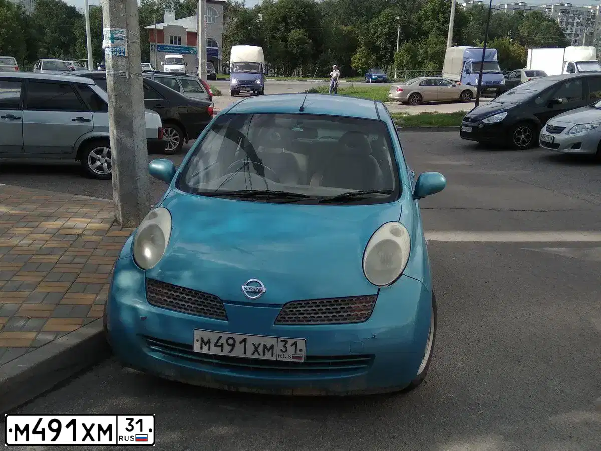 Фото автомобиля LADA 2170 PRIORA, 2009 — госномер М491ХА31. Цвет: СИНЕ-ЧЕРНЫЙ