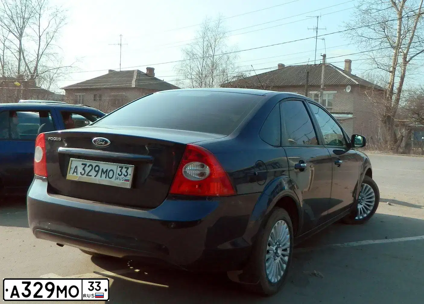 Фото автомобиля FORD FOCUS, 2010 — госномер А329МО33. Цвет: СИНИЙ