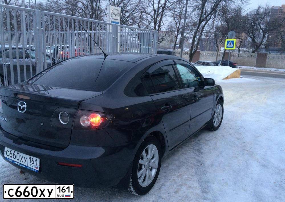 Фото автомобиля MAZDA 3, 2007 — госномер С660ХУ161. Цвет: ТЕМНО-СЕРЫЙ