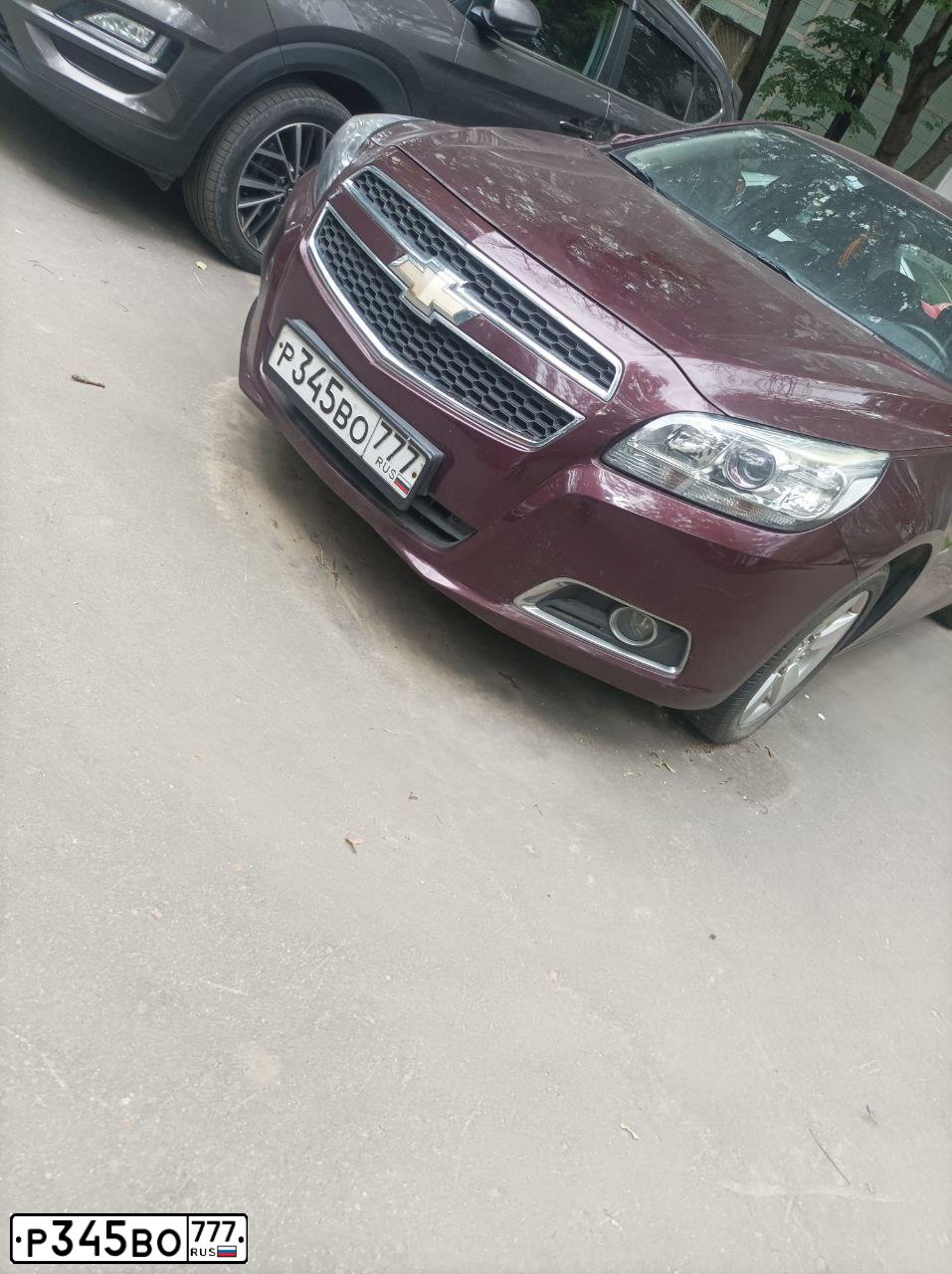 Фото автомобиля CHEVROLET MALIBU, 2012 — госномер Р345ВО777. Цвет: КРАСНЫЙ