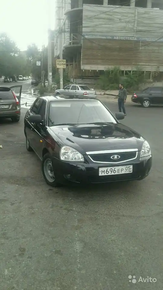 Фото автомобиля LADA 1117 KALINA, 2012 — госномер Х163ЕС05. Цвет: Белый
