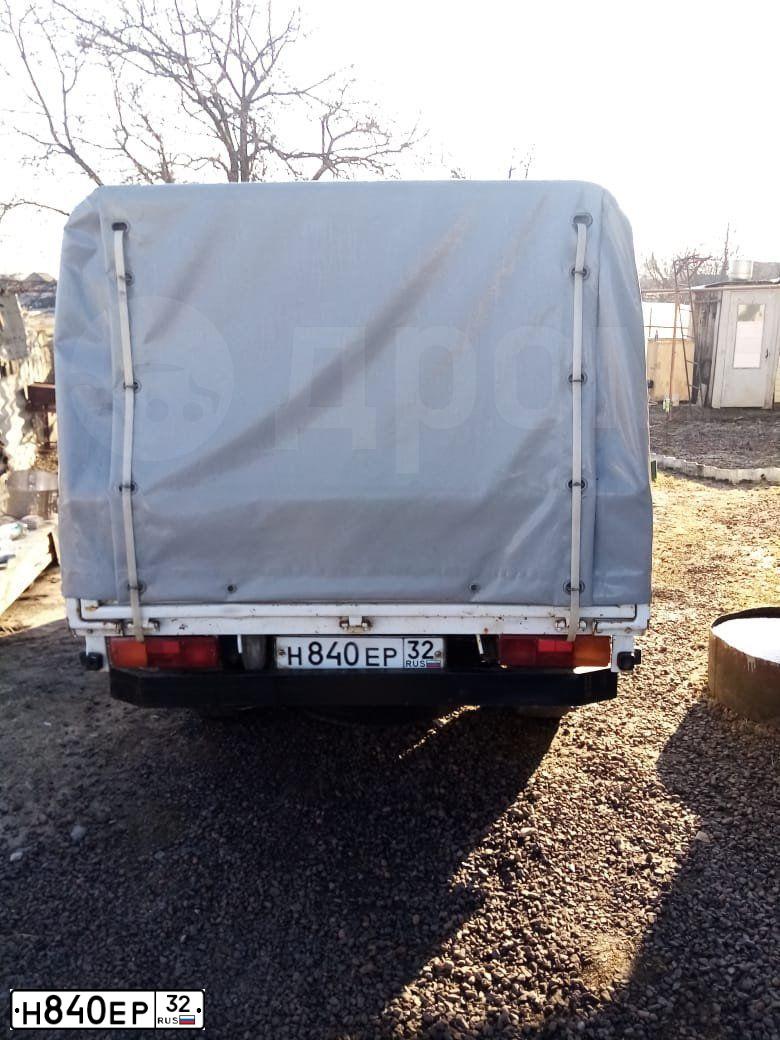 Фото автомобиля HYUNDAI TUCSON, 2007 — госномер Н840ЕР32. Цвет: ТЕМНО-СЕРЫЙ