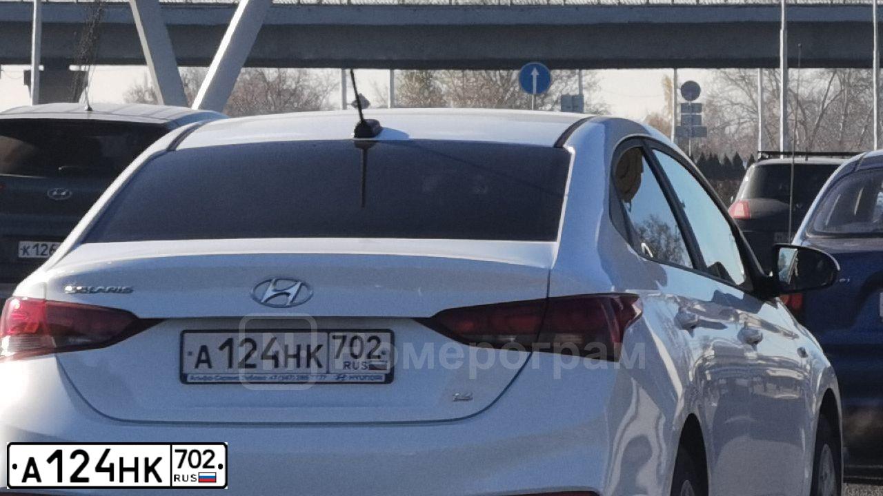 Фото автомобиля HYUNDAI SOLARIS, 2020 — госномер Н911МЕ702. Цвет: Белый
