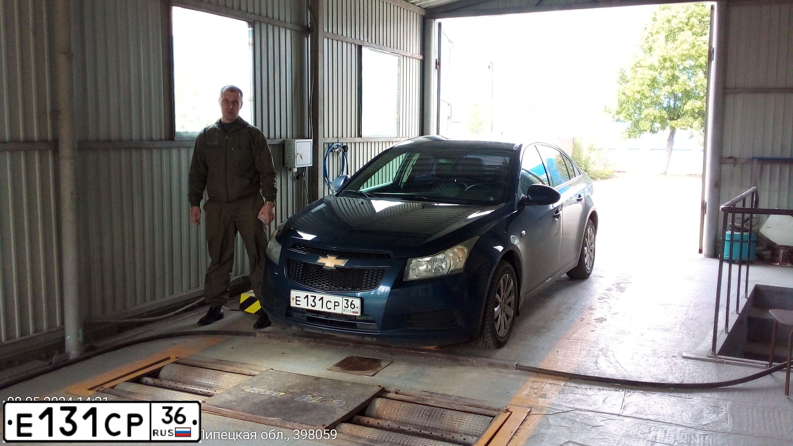 Фото автомобиля CHEVROLET CRUZE, 2011 — госномер Р249ОК48. Цвет: синий