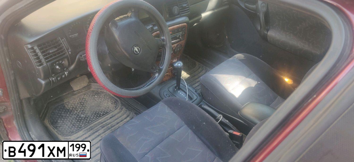 Фото автомобиля OPEL VECTRA, 1997 — госномер Н192УА69. Цвет: ВИШНЕВЫЙ