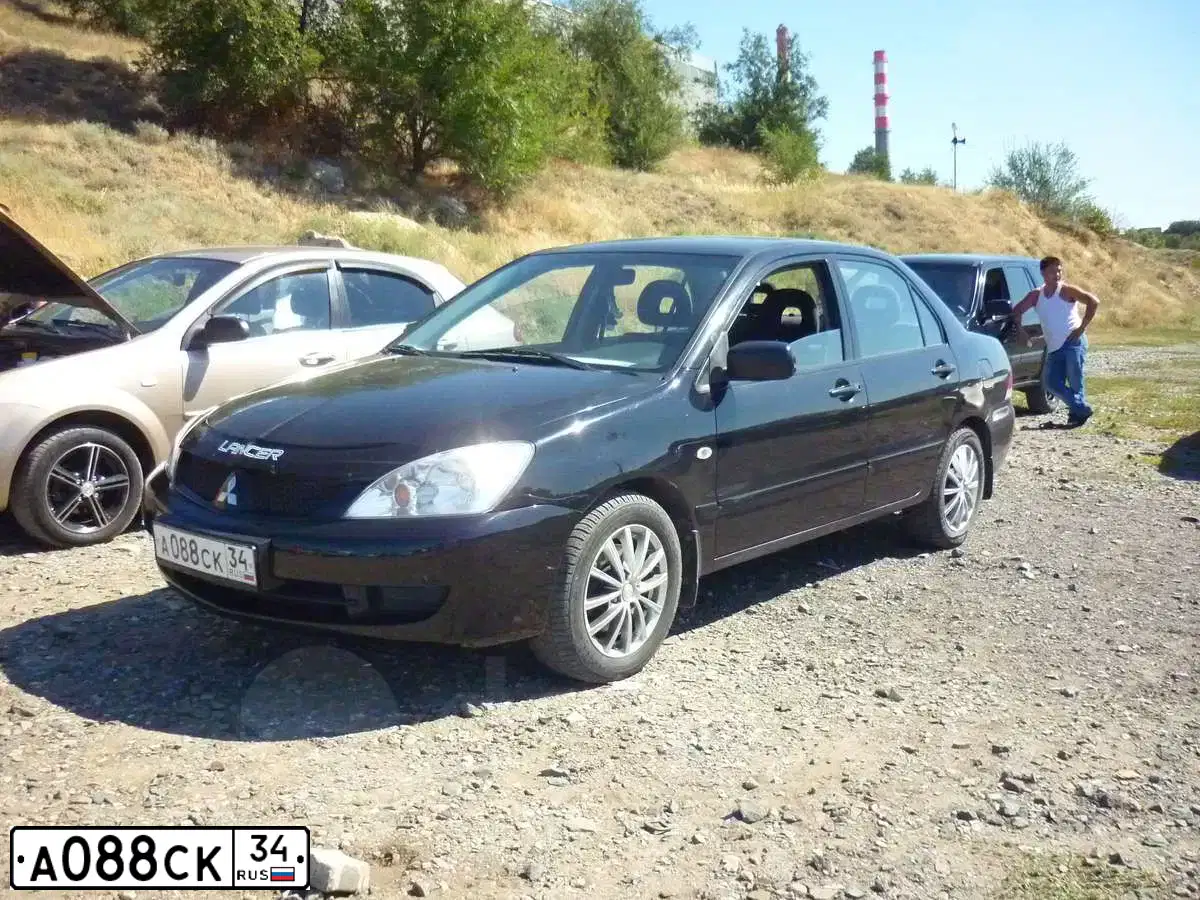 Фото автомобиля MITSUBISHI LANCER, 2005 — госномер А331ВС134. Цвет: ЧЕРНЫЙ