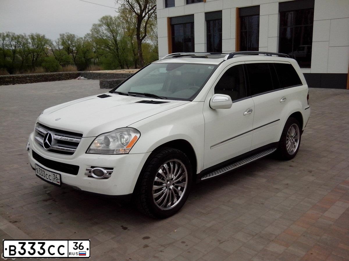 Фото автомобиля INFINITI QX80 /QX56/, 2005 — госномер А056НС55. Цвет: СВЕТЛО-СЕРЫЙ