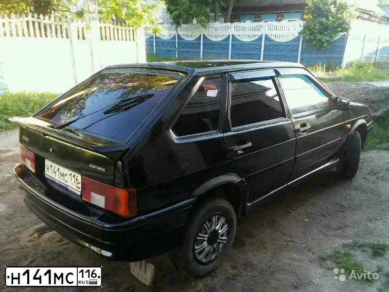 Фото автомобиля LADA 2114 SAMARA, 2010 — госномер Н141МС116. Цвет: Сине-Черный