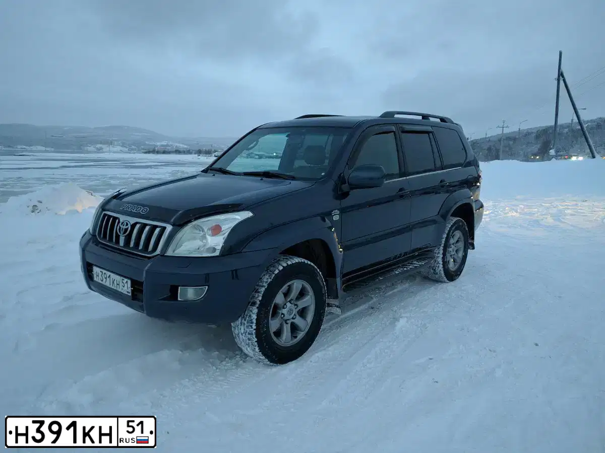 Фото автомобиля TOYOTA LANDCRUISER, 2003 — госномер Н391КН51. Цвет: ТЕМНО-СИНИЙ