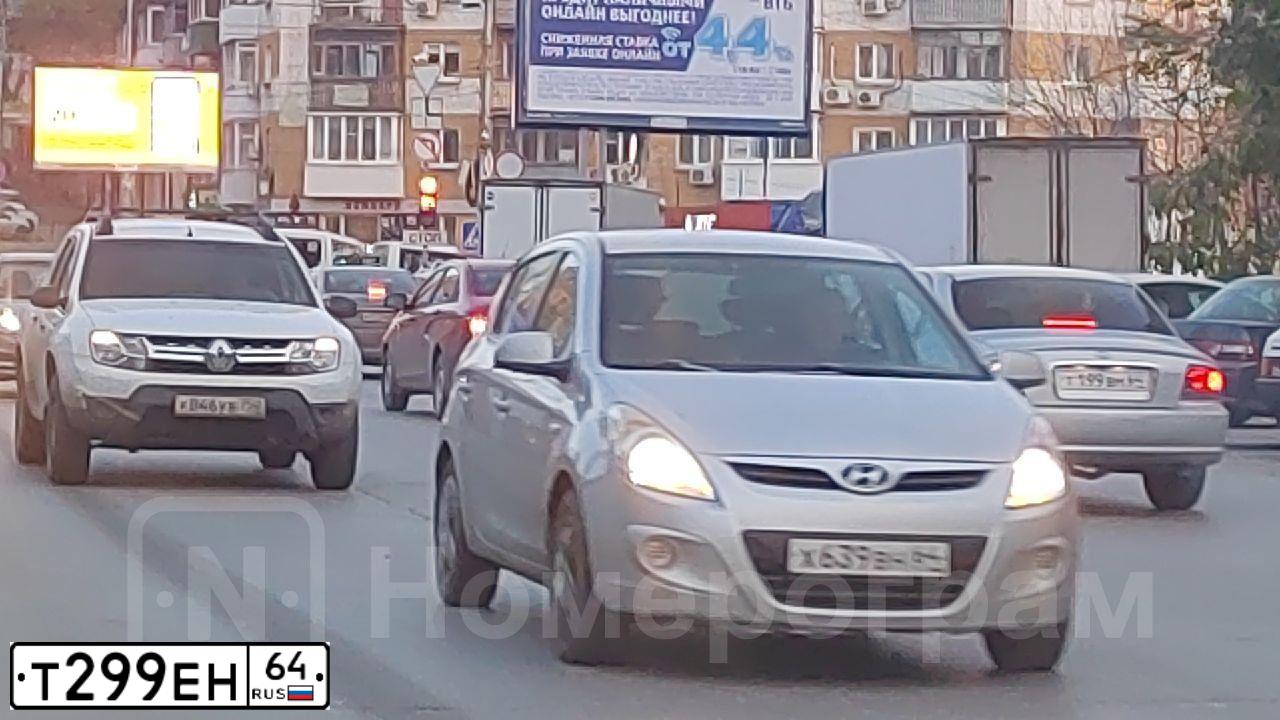 Фото автомобиля VOLKSWAGEN TIGUAN, 2012 — госномер К095ВО134. Цвет: СЕРО СИНИЙ
