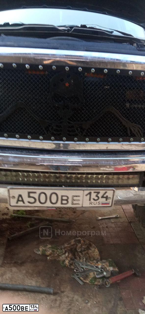 Фото автомобиля NISSAN NAVARA, 2008 — госномер Е082НА164. Цвет: СЕРЕБРИСТЫЙ
