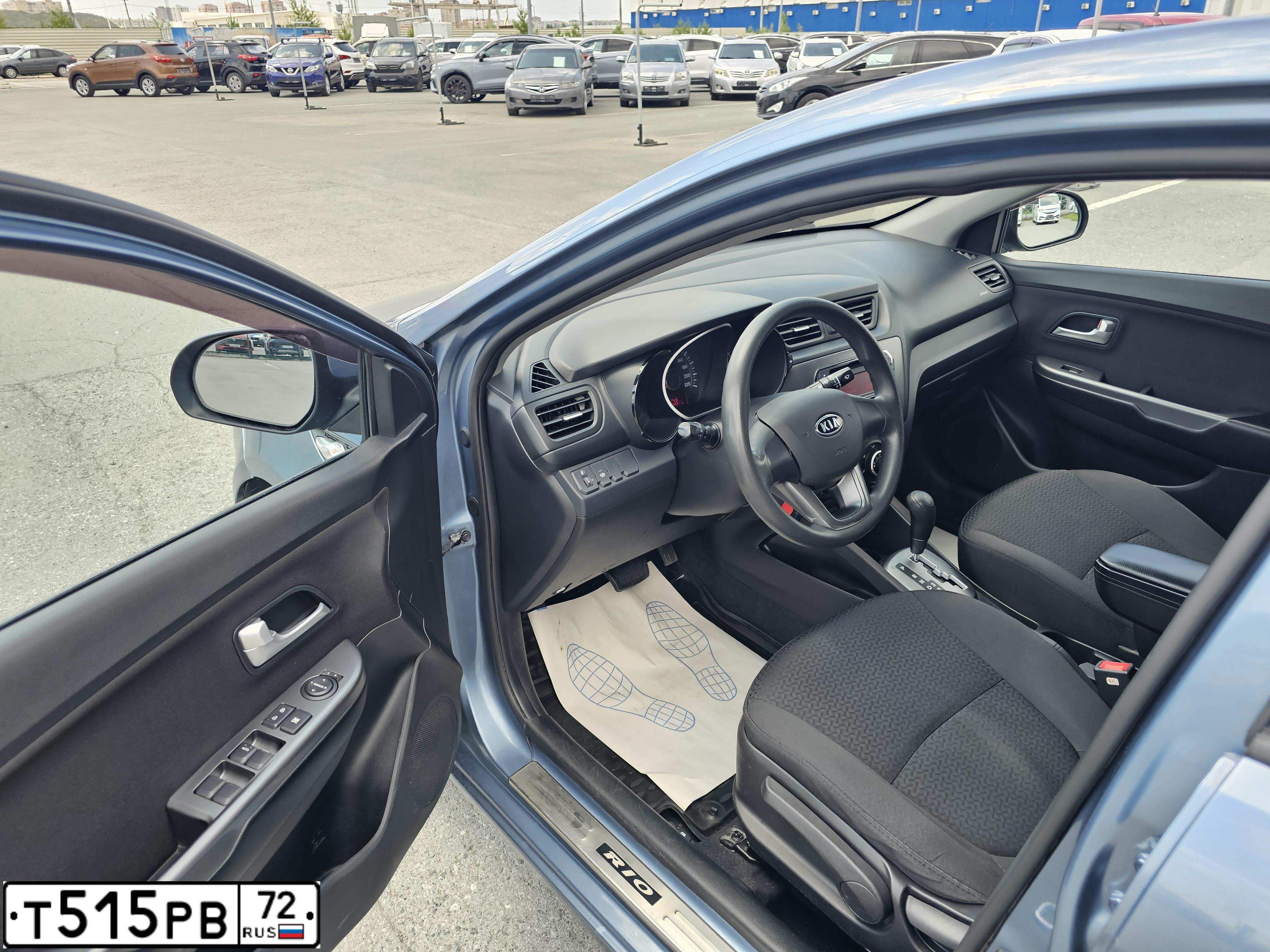 Фото автомобиля KIA RIO, 2011 — госномер Т515РВ72. Цвет: голубой