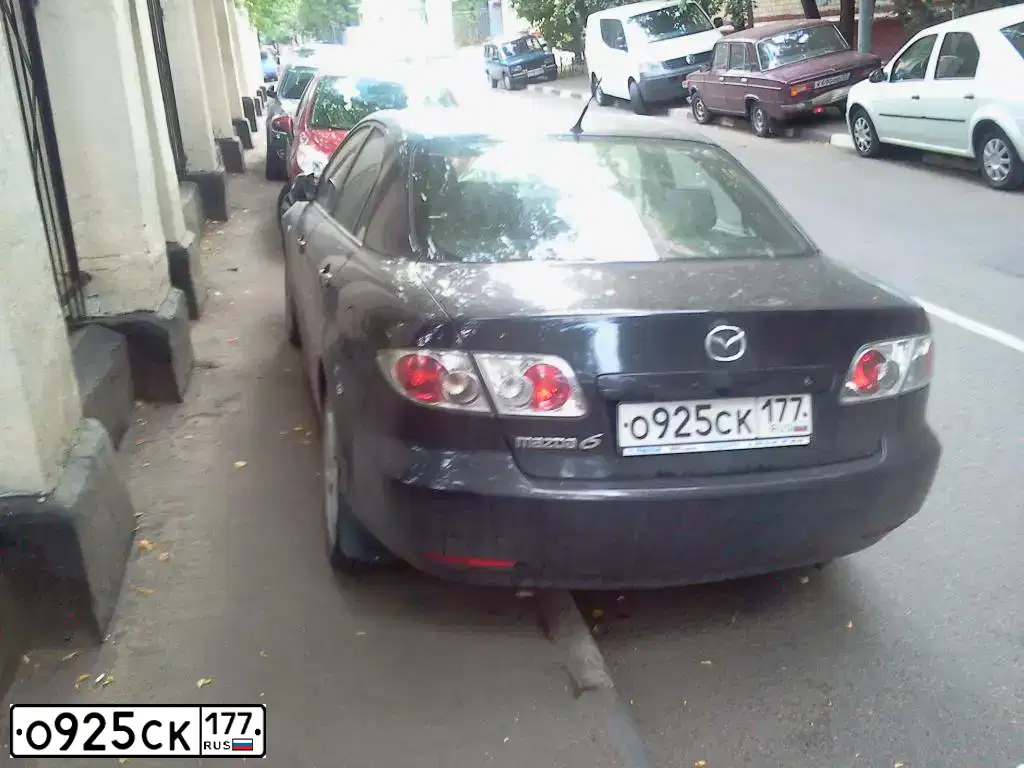 Фото автомобиля MAZDA 6, 2004 — госномер М427ОВ799. Цвет: ЧЕРНЫЙ