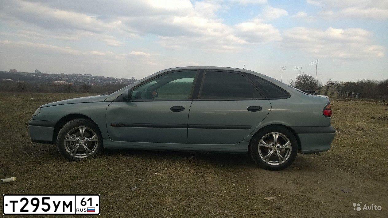 Фото автомобиля RENAULT LAGUNA, 2000 — госномер Т259УМ61. Цвет: ГОЛУБОЙ