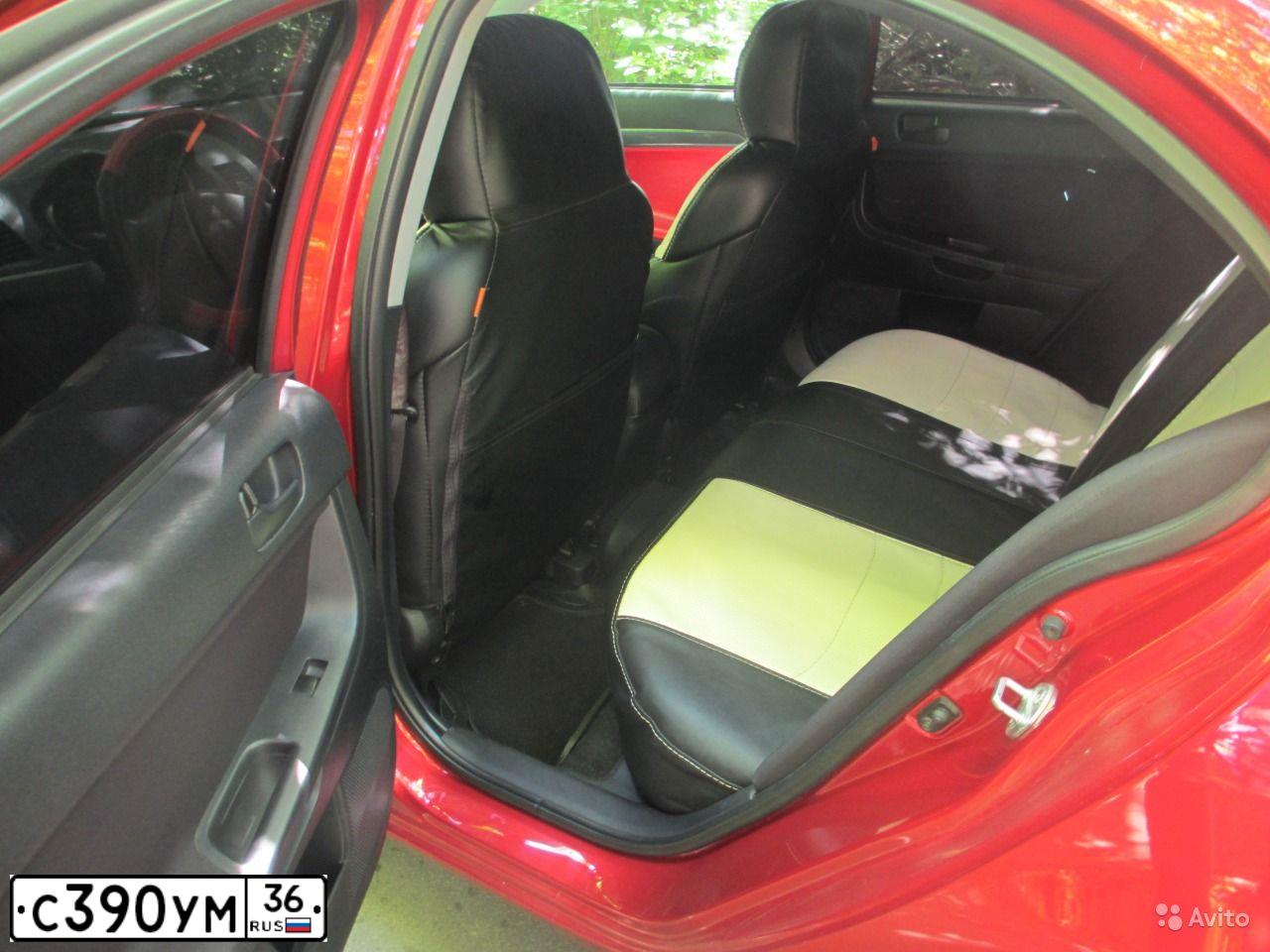 Фото автомобиля MITSUBISHI LANCER, 2008 — госномер С390УМ36. Цвет: Красный