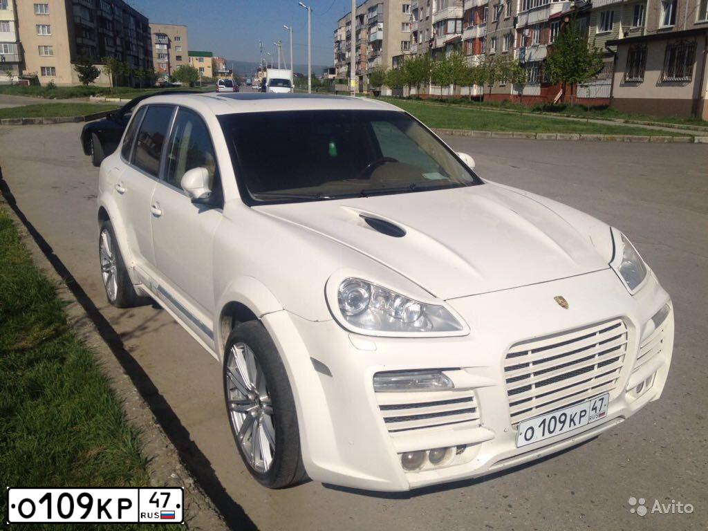Фото автомобиля PORSCHE CAYENNE, 2005 — госномер Н373ЕО180. Цвет: Белый