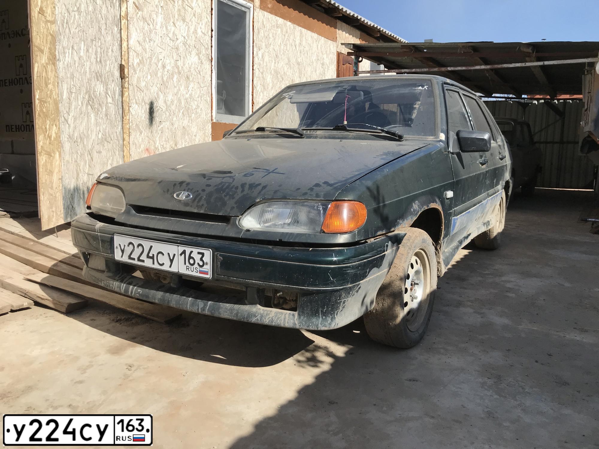 Фото автомобиля LADA 2115 SAMARA, 2004 — госномер Н990НО30. Цвет: Темно-зеленый