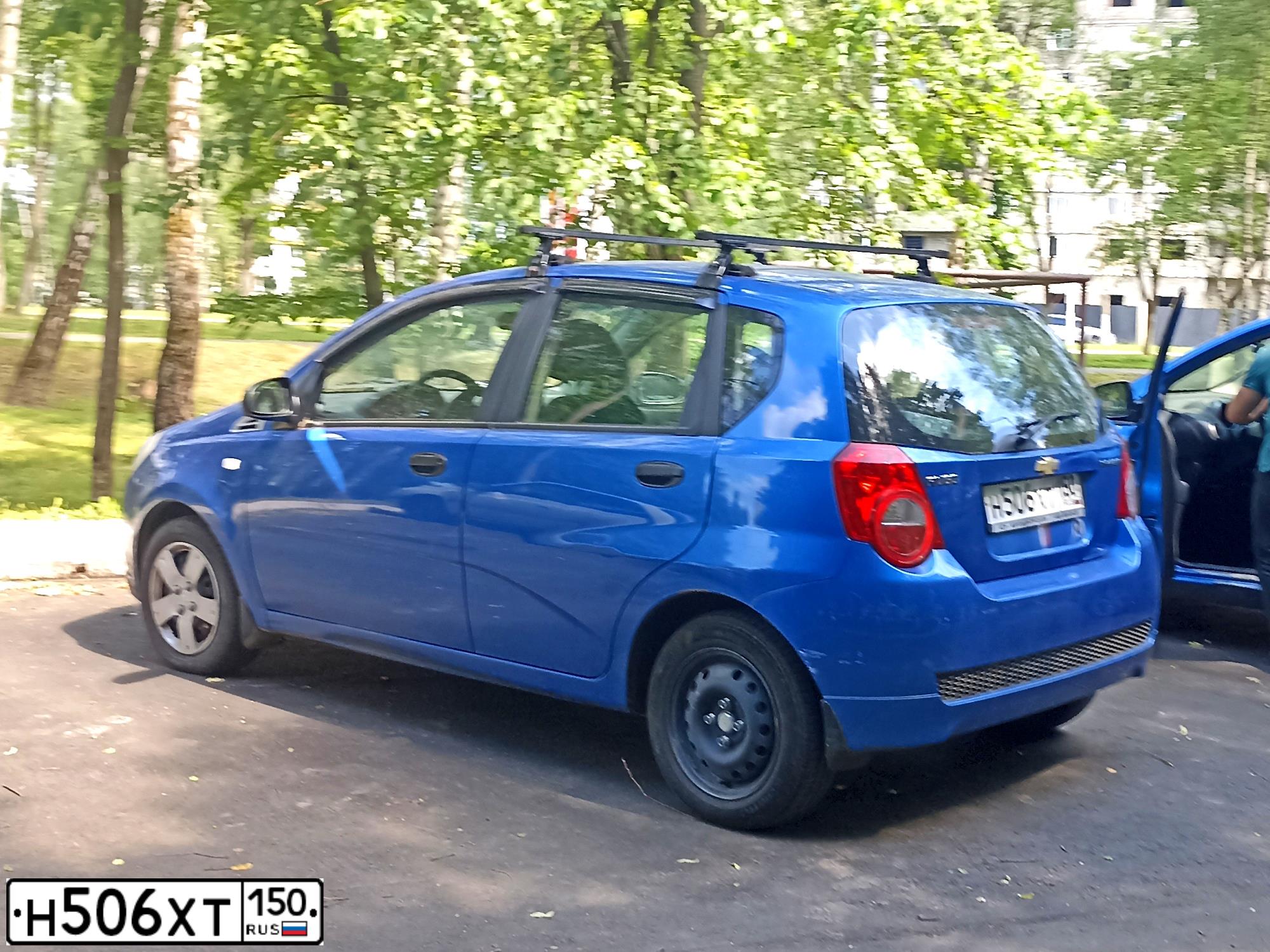 Фото автомобиля CHEVROLET AVEO, 2008 — госномер В262УХ702. Цвет: СИНИЙ