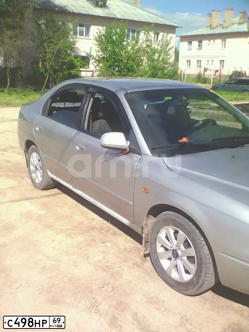 Фото автомобиля KIA SHUMA, 2003 — госномер С498НР69. Цвет: СЕРЕБРИСТЫЙ