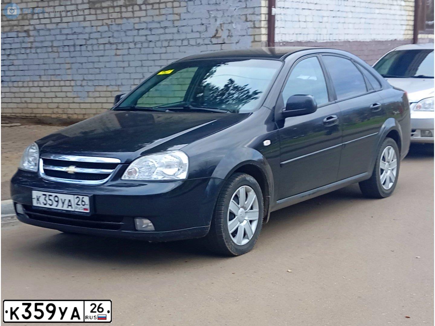 Фото автомобиля CHEVROLET LACETTI, 2012 — госномер К359УА26. Цвет: ЧЕРНЫЙ