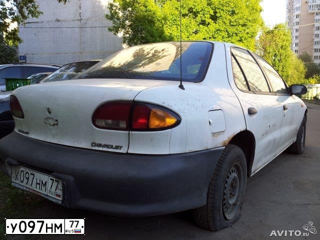 Фото автомобиля CHEVROLET CAVALIER, 1997 — госномер У097НМ77. Цвет: БЕЛЫЙ
