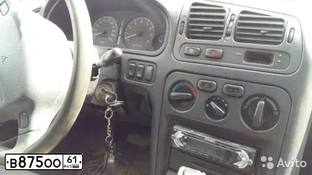 Фото автомобиля MITSUBISHI GALANT, 1996 — госномер В875ОО61. Цвет: синий