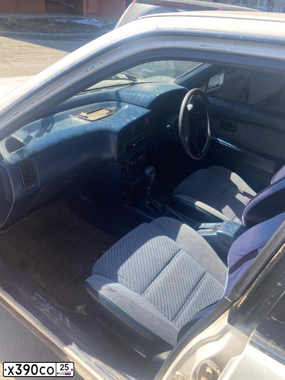 Фото автомобиля TOYOTA CARINA, 1989 — госномер Х390СО25
