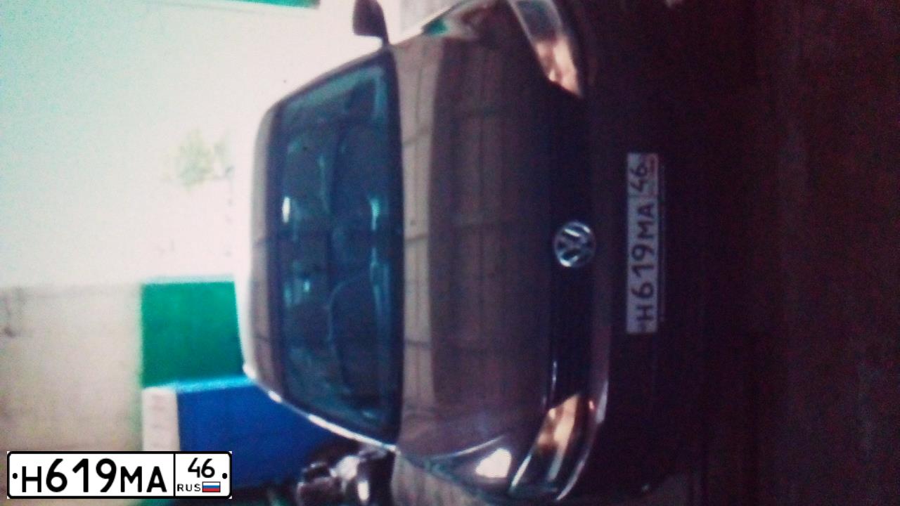 Фото автомобиля VOLKSWAGEN JETTA, 2014 — госномер Х721ХР31. Цвет: Коричневый