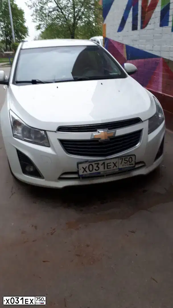 Фото автомобиля CHEVROLET CRUZE, 2013 — госномер Х031ЕХ750. Цвет: Белый