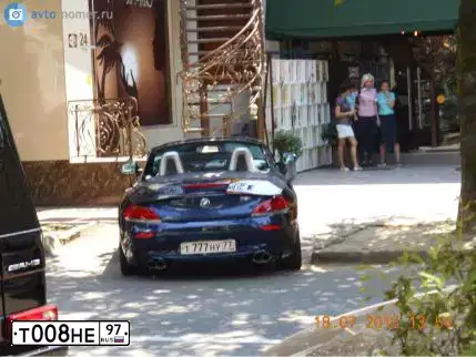 Фото автомобиля FORD FOCUS, 2003 — госномер Т008НЕ97. Цвет: СЕРО-ЗОЛОТИСТЫЙ