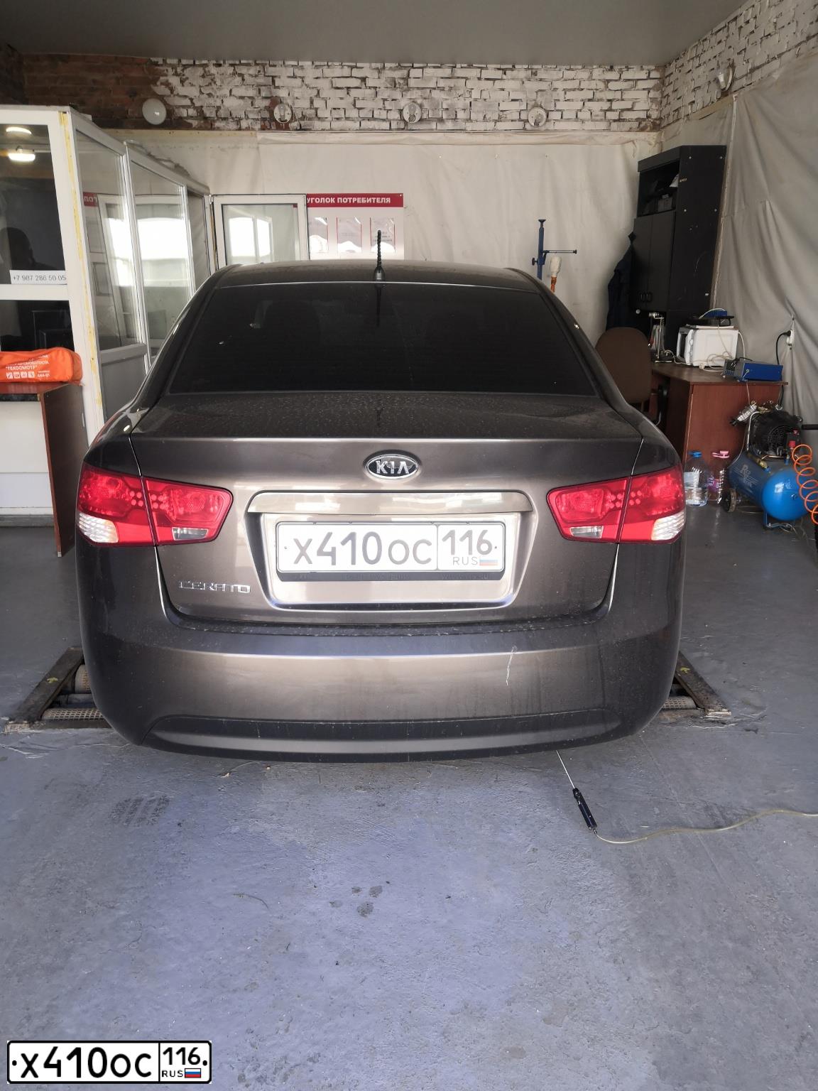 Фото автомобиля KIA CERATO, 2011 — госномер Х410ОС116. Цвет: бронзовый